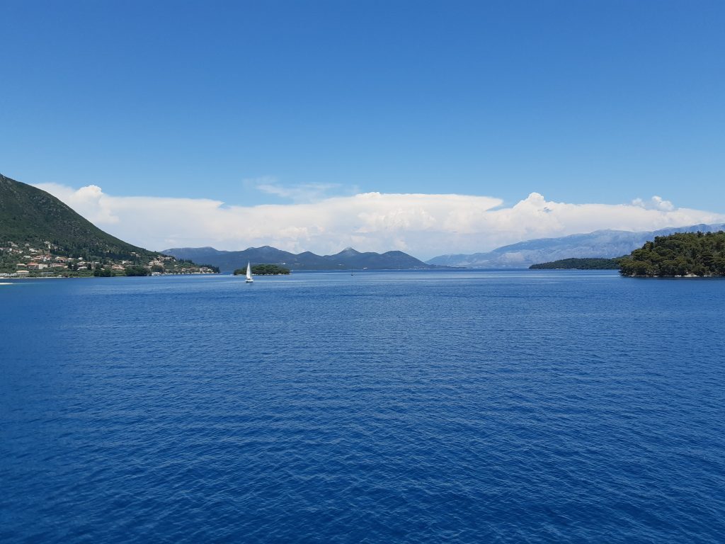 Drift away to a Greek paradise with the bluest of seas. Ideal imagery for relaxation.